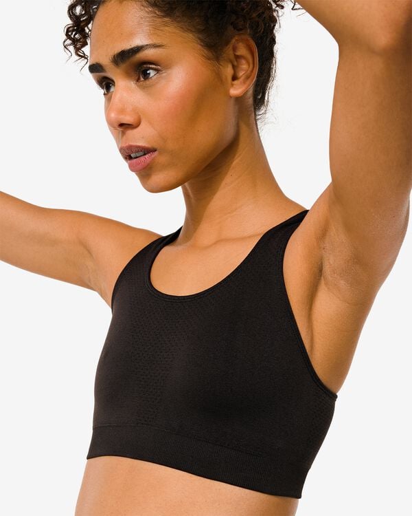 naadloze sporttop medium support zwart - 1000030850 - HEMA